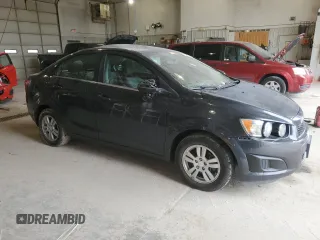 2015 Chevrolet Sonic LT with VIN 1G1JC5SB5F4132270, listed as a Copart auction lot 51223175 with 138,644 mi miles and Salvage Title. Bid and sale history available at DreamBid. Image 4.