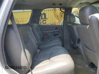 2004 Chevrolet Tahoe LS z VIN 1GNEC13T94R165160, wystawiony jako Copart lot #59994985 z przebiegiem 303 473 mil mil oraz Szkoda całkowita • Salvage title. Historia ofert i sprzedaży dostępna na DreamBid. Obrazek 11.