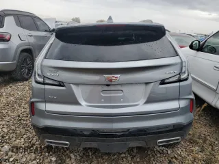 2024 Cadillac XT4 AWD Sport with VIN 1GYFZFR49RF134390, listed as a Copart auction lot 73012834 with 6,092 mi miles and Salvage title. Bid and sale history available at DreamBid. Image 6.