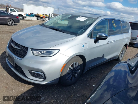 2023 Chrysler Pacifica Hybrid Limited with VIN 2C4RC1S78PR551260, listed as a IAAI auction lot 41992752 with 55,136 mi miles and . Bid and sale history available at DreamBid. Image 19.