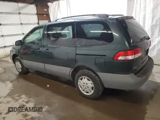 2001 Toyota Sienna LE with VIN 4T3ZF13C21U364516, listed as a Copart auction lot 79759924 with 100,185 mi miles and Salvage Title. Bid and sale history available at carsss.com. Image 2.