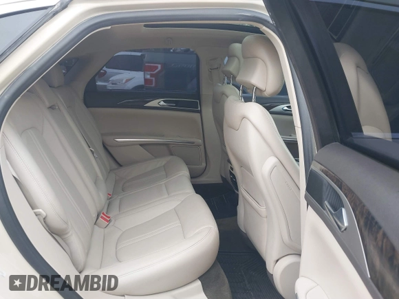 2016 Lincoln MKZ with VIN 3LN6L2J94GR625923, listed as a IAAI auction lot 41144427 with 120,567 mi miles and . Bid and sale history available at DreamBid. Image 8.