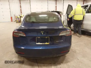 2018 Tesla Model 3 Long Range Battery with VIN 5YJ3E1EB7JF086201, listed as a IAAI auction lot 41965193 with 99,231 mi miles and . Bid and sale history available at DreamBid. Image 16.