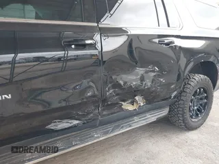 2021 Chevrolet Suburban LT z VIN 1GNSCCKDXMR421833, wystawiony jako IAAI lot #41738389 z przebiegiem 56 757 mil mil oraz . Historia ofert i sprzedaży dostępna na DreamBid. Obrazek 6.