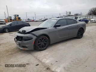 2019 Dodge Charger SXT with VIN 2C3CDXBG5KH672918, listed as a Copart auction lot 86315804 with 116,515 mi miles and Salvage title. Bid and sale history available at DreamBid. Image 1.