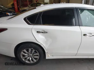 2015 Nissan Altima SV with VIN 1N4AL3AP7FC436155, listed as a IAAI auction lot 41642154 with 85,977 mi miles and . Bid and sale history available at DreamBid. Image 14.