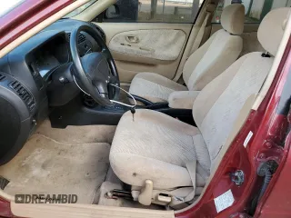 2000 Mitsubishi Mirage DE z VIN JA3AY26C1YU026930, wystawiony jako Copart lot #74153834 z przebiegiem 126 800 mil mil oraz Czysty tytuł • Clean title. Historia ofert i sprzedaży dostępna na DreamBid. Obrazek 7.