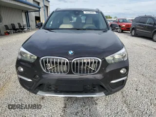 2019 BMW X1 xDrive28i with VIN WBXHT3C53K5N27090, listed as a Copart auction lot 54150485 with 79,835 mi miles and Salvage title. Bid and sale history available at DreamBid. Image 5.