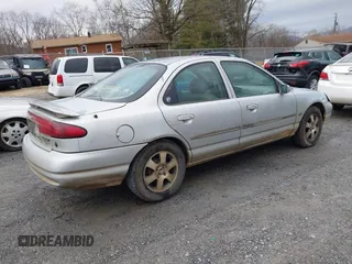 1998 Mercury Mystique z VIN 3MEFM66L2WM611980, wystawiony jako IAAI lot #41391920 z przebiegiem 199 491 mil mil oraz . Historia ofert i sprzedaży dostępna na DreamBid. Obrazek 4.