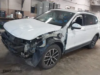2021 Volkswagen Tiguan SE with VIN 3VV2B7AX1MM142501, listed as a IAAI auction lot 40983853 with 45,121 mi miles. Bid and sale history available at carsss.com. Image 2.