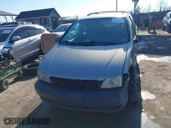 2003 Toyota Sienna LE with VIN 4T3ZF13C03U524122, listed as a IAAI auction lot 41655361 with 216,256 mi miles. Bid and sale history available at carsss.com. Image 12.