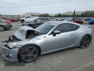 2015 Scion FR-S z VIN JF1ZNAA10F8712286, wystawiony jako Copart lot #53092555 z przebiegiem 97 888 mil mil oraz Szkoda całkowita • Salvage title. Historia ofert i sprzedaży dostępna na DreamBid. Obrazek 1.