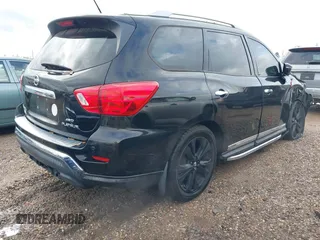 2017 Nissan Pathfinder SL with VIN 5N1DR2MM7HC667864, listed as a IAAI auction lot 41219528 with 127,240 mi miles. Bid and sale history available at carsss.com. Image 4.