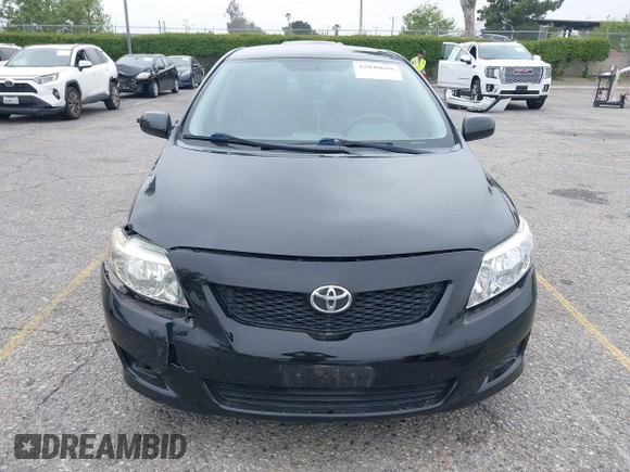 2010 Toyota Corolla with VIN 1NXBU4EE1AZ285449, listed as a IAAI auction lot 42040668 with 121,404 mi miles and . Bid and sale history available at carsss.com. Image 12.