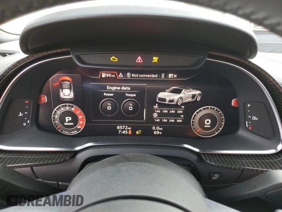 2018 Audi R8 z VIN WUAVACFX8J7900987, wystawiony jako Copart lot #45409684 z przebiegiem 6572 mil mil oraz . Historia ofert i sprzedaży dostępna na DreamBid. Obrazek 9.