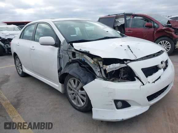 2010 Toyota Corolla with VIN 2T1BU4EEXAC521114, listed as a IAAI auction lot 42066903 with 208,509 mi miles. Bid and sale history available at carsss.com. Image 1.