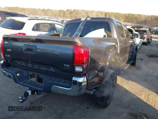 2018 Toyota Tacoma SR with VIN 5TFCZ5AN7JX154112, listed as a IAAI auction lot 41394058 with 158,045 mi miles. Bid and sale history available at carsss.com. Image 4.