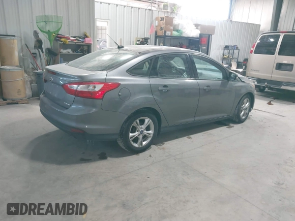 2014 Ford Focus SE with VIN 1FADP3F28EL285971, listed as a IAAI auction lot 41290979 with 149,900 mi miles. Bid and sale history available at carsss.com. Image 4.