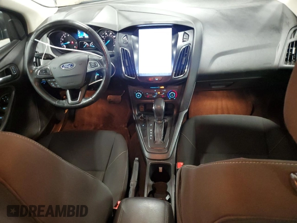 2017 Ford Focus SE with VIN 1FADP3F21HL205754, listed as a Copart auction lot 63632985 with 96,797 mi miles and Salvage title. Bid and sale history available at DreamBid. Image 8.