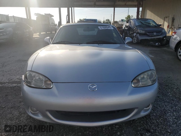 2002 Mazda MX-5 Miata Cloth with VIN JM1NB353420220801, listed as a Copart auction lot 61808645 with 116,451 mi miles and Salvage title. Bid and sale history available at DreamBid. Image 5.