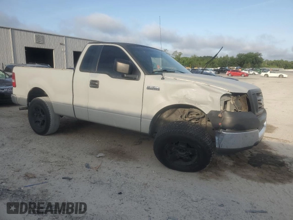 2005 Ford F-150 XL with VIN 1FTRF12235NC10435, listed as a Copart auction lot 57311935 with 249,847 mi miles and Salvage title. Bid and sale history available at DreamBid. Image 4.