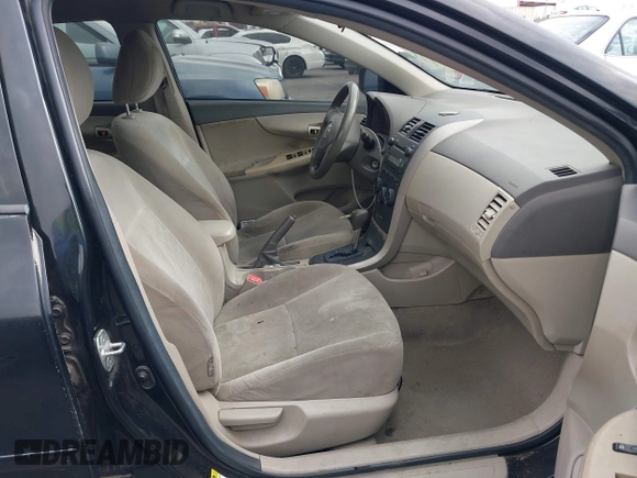 2009 Toyota Corolla with VIN 1NXBU40E59Z093650, listed as a IAAI auction lot 42121575 with 166,631 mi miles. Bid and sale history available at carsss.com. Image 5.