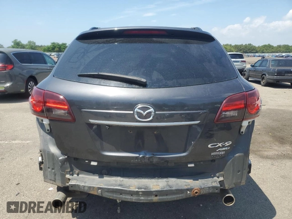 2014 Mazda CX-9 Grand Touring with VIN JM3TB3DV9E0444720, listed as a Copart auction lot 63687855 with 144,568 mi miles and Salvage title. Bid and sale history available at DreamBid. Image 6.