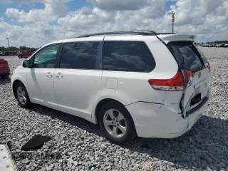2011 Toyota Sienna LE AAS with VIN 5TDKK3DC9BS100400, listed as a Copart auction lot 62060125 with 210,274 mi miles and Salvage title. Bid and sale history available at DreamBid. Image 2.