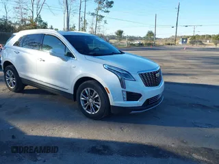 2021 Cadillac XT5 AWD Premium Luxury with VIN 1GYKNDRS3MZ115273, listed as a IAAI auction lot 41228531 with 46,556 mi miles. Bid and sale history available at carsss.com. Image 1.