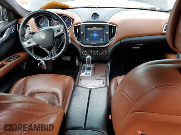 2016 Maserati Ghibli S Q4 с VIN ZAM57RTA8G1189149, выставлен на аукционе Copart как лот 45127015 с пробегом 123 154 миль миль и Списание • Salvage title. История ставок и продаж доступна на DreamBid. Изображение 8.