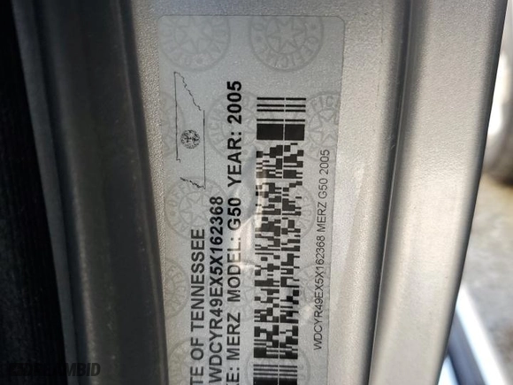 2005 Mercedes-Benz G-Class with VIN WDCYR49EX5X162368, listed as a Copart auction lot 53579154 with 151,040 mi miles and Salvage Title. Bid and sale history available at carsss.com. Image 13.