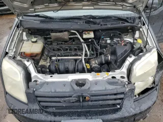 2010 Ford Transit Connect XLT z VIN NM0KS9BN5AT032732, wystawiony jako Copart lot #53851165 z przebiegiem 229 512 mil mil oraz Szkoda całkowita • Salvage title. Historia ofert i sprzedaży dostępna na DreamBid. Obrazek 12.