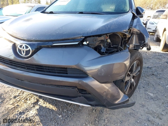 2016 Toyota RAV4 XLE with VIN 2T3WFREV0GW266691, listed as a IAAI auction lot 41804023 with 77,000 mi miles. Bid and sale history available at carsss.com. Image 6.