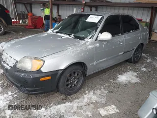 2005 Hyundai Accent GLS with VIN KMHCG45C75U656548, listed as a IAAI auction lot 41553603 with 178,070 mi miles. Bid and sale history available at carsss.com. Image 2.