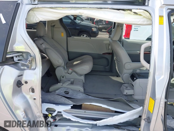 2014 Toyota Sienna XLE with VIN 5TDYK3DC0ES451307, listed as a IAAI auction lot 42093569 with 105,721 mi miles and . Bid and sale history available at DreamBid. Image 8.