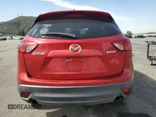 2016 Mazda CX-5 Touring with VIN JM3KE2CY9G0807478, listed as a Copart auction lot 47393775 with 105,034 mi miles and Salvage Title. Bid and sale history available at carsss.com. Image 6.