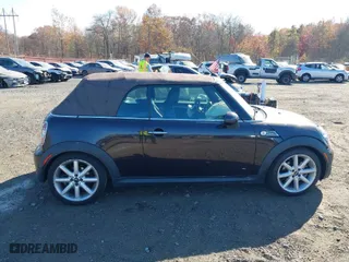 2013 MINI Cooper Convertible S with VIN WMWZP3C56DT705074, listed as a IAAI auction lot 40762024 with 57,685 mi miles. Bid and sale history available at carsss.com. Image 13.