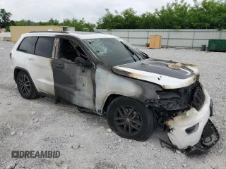 2017 Jeep Grand Cherokee Trailhawk with VIN 1C4RJFLG9HC602034, listed as a Copart auction lot 59823085 with Not provided miles and Salvage title. Bid and sale history available at DreamBid. Image 4.