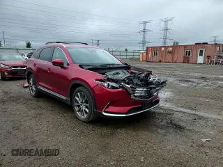 2018 Mazda CX-9 Grand Touring z VIN JM3TCBDYXJ0207231, wystawiony jako Copart lot #57911615 z przebiegiem 109 027 mil mil oraz Szkoda całkowita • Salvage title. Historia ofert i sprzedaży dostępna na DreamBid. Obrazek 14.