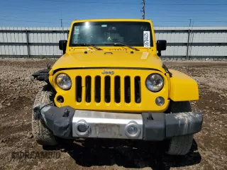 2015 Jeep Wrangler Unlimited Sahara with VIN 1C4HJWEG7FL593355, listed as a Copart auction lot 56784425 with 74,498 mi miles and Salvage title. Bid and sale history available at DreamBid. Image 5.