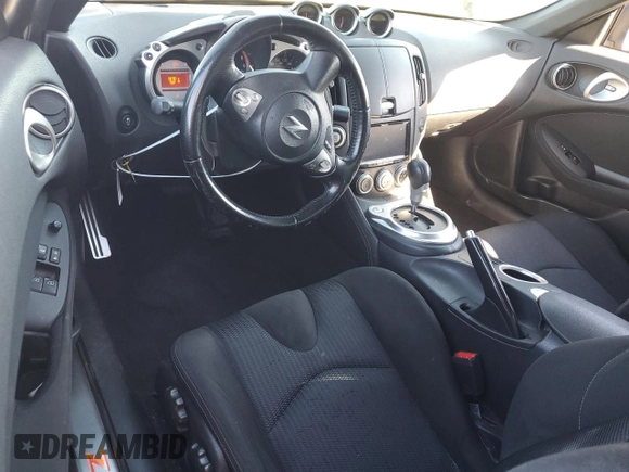 2012 Nissan 370Z Touring with VIN JN1AZ4EH4CM561432, listed as a Copart auction lot 89376935 with 128,955 mi miles and Salvage Title. Bid and sale history available at carsss.com. Image 8.
