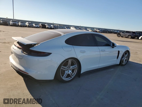 2022 Porsche Panamera z VIN WP0AJ2A73NL100639, wystawiony jako Copart lot #81958053 z przebiegiem 3 399 mil mil oraz Czysty tytuł • Clean title. Historia ofert i sprzedaży dostępna na DreamBid. Obrazek 3.