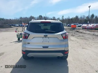 2017 Ford Escape Titanium with VIN 1FMCU9JD3HUE03686, listed as a IAAI auction lot 42016950 with 82,299 mi miles. Bid and sale history available at carsss.com. Image 16.
