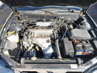 1996 Toyota Camry DX with VIN JT2BG12KXT0407961, listed as a IAAI auction lot 41511138 with 266,781 mi miles. Bid and sale history available at carsss.com. Image 10.