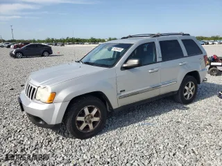 2009 Jeep Grand Cherokee Laredo with VIN 1J8GR48K09C551423, listed as a Copart auction lot 54094465 with 163,263 mi miles and Clean Title. Bid and sale history available at carsss.com. Image 1.