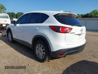 2015 Mazda CX-5 Sport with VIN JM3KE2BE6F0541469, listed as a IAAI auction lot 42632906 with 166,257 mi miles and . Bid and sale history available at DreamBid. Image 3.