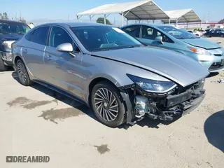 2021 Hyundai Sonata Hybrid SEL with VIN KMHL34JJ7MA026559, listed as a IAAI auction lot 41657589 with 119,019 mi miles. Bid and sale history available at carsss.com. Image 1.