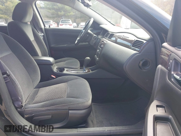 2012 Chevrolet Impala LS Retail with VIN 2G1WA5E36C1234992, listed as a IAAI auction lot 42094459 with 105,327 mi miles and . Bid and sale history available at DreamBid. Image 5.