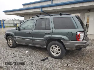 2002 Jeep Grand Cherokee z VIN 1J4GX38S72C152046, wystawiony jako Copart lot #57963095 z przebiegiem 204 576 mil mil oraz Szkoda całkowita • Salvage title. Historia ofert i sprzedaży dostępna na DreamBid. Obrazek 2.