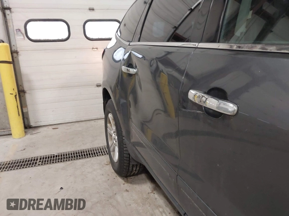 2013 Chevrolet Traverse LT with VIN 1GNKVJKD9DJ152592, listed as a IAAI auction lot 41143281 with 199,259 mi miles and . Bid and sale history available at DreamBid. Image 18.